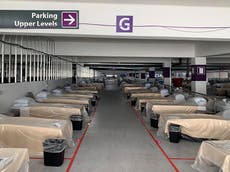 Reno hospital starts treating Covid patients in parking garage ward 