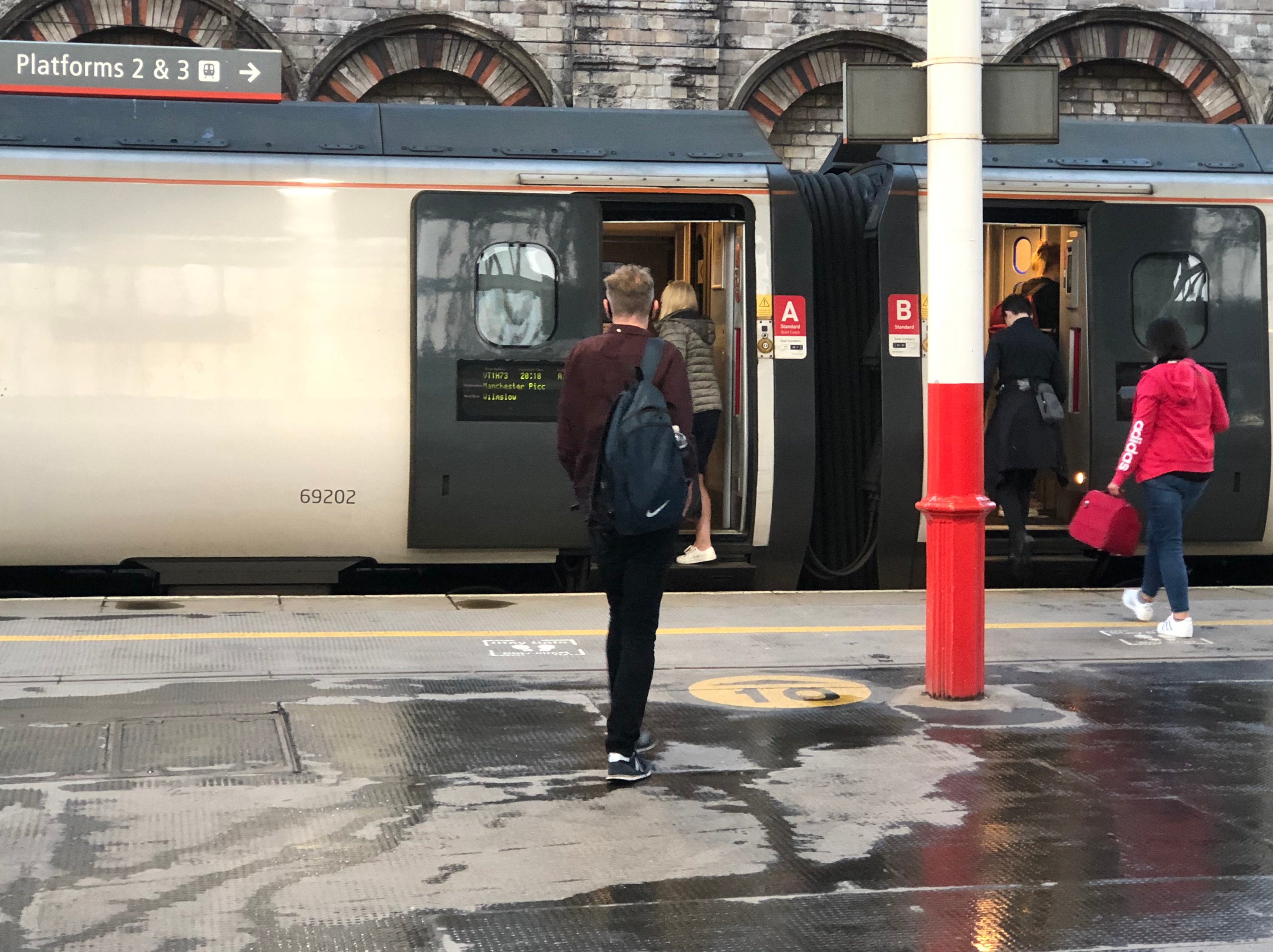 Paying less: Passengers boarding an Avanti West Coast train at Crewe
