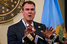 Oklahoma governor's holiday plans flout CDC, virus surge