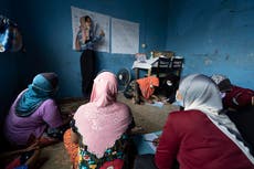 Malaysia group teaches refugee women how to read and write