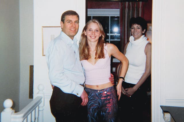<p>Prince Andrew stands with his arm around Virginia Giuffre as Ghislaine Maxwell looks on. </p>