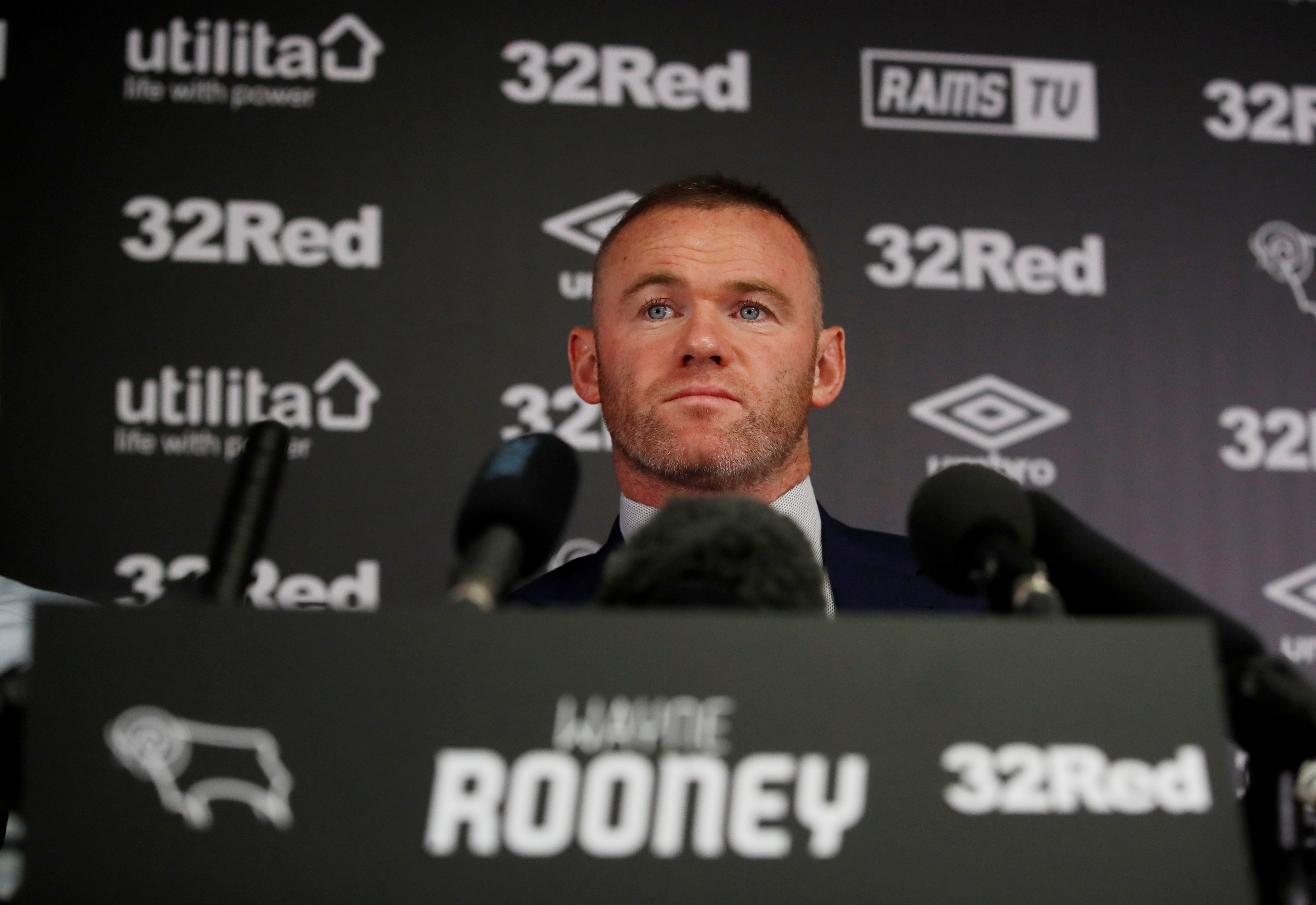 Wayne Rooney believes a delay in gaining his coaching badges will not hinder his new role with Derby County