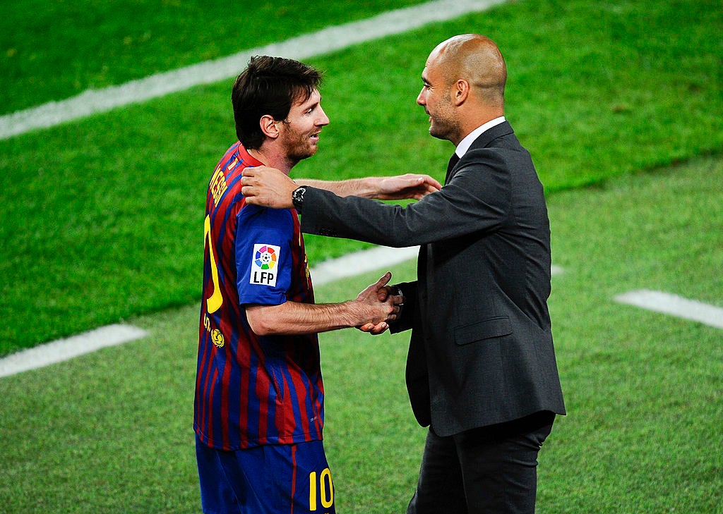 Lionel Messi and Pep Guardiola