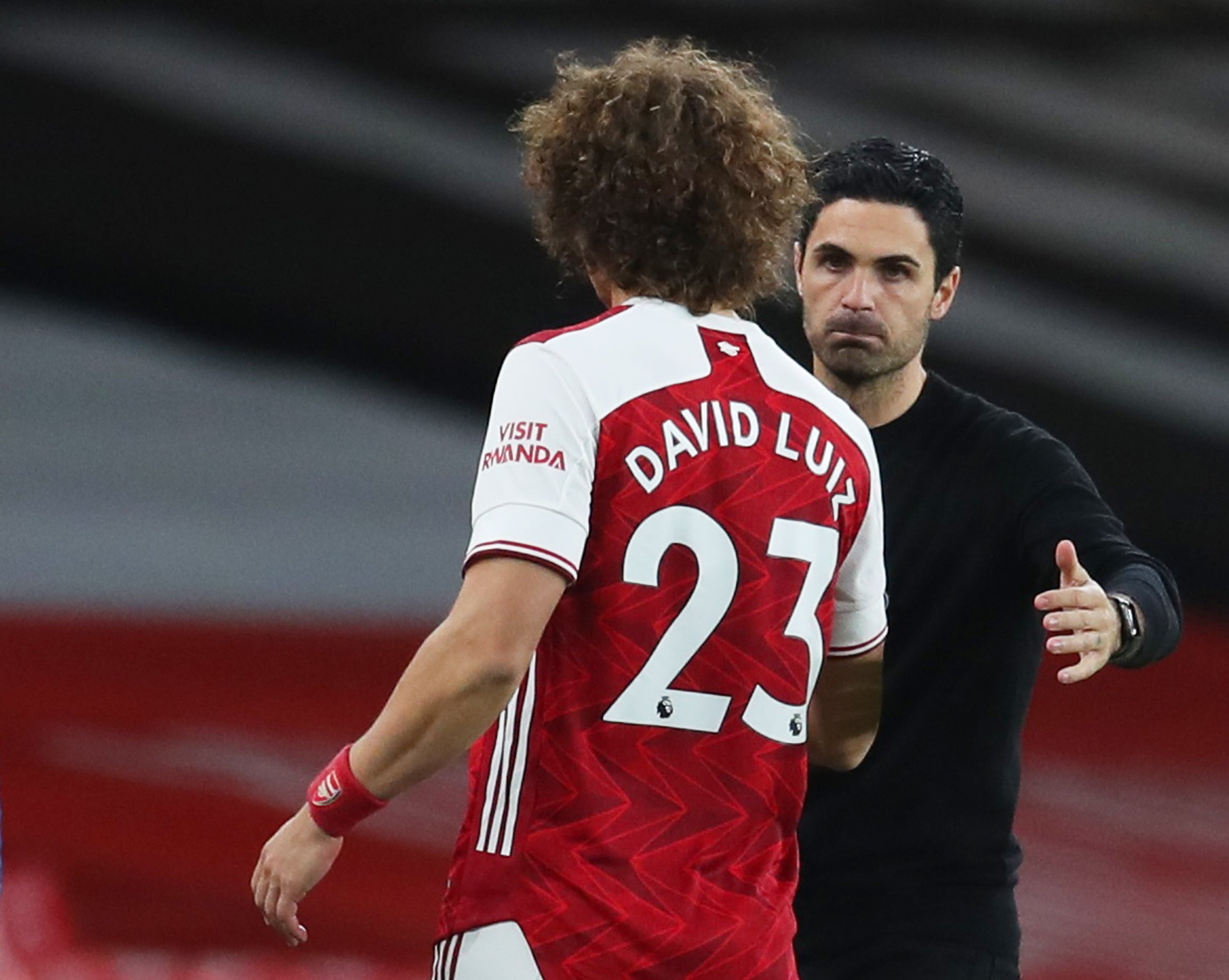 Mikel Arteta and David Luiz of Arsenal