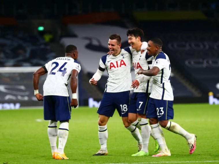 Giovani Lo Celso of Tottenham Hotspur celebrates with teammates