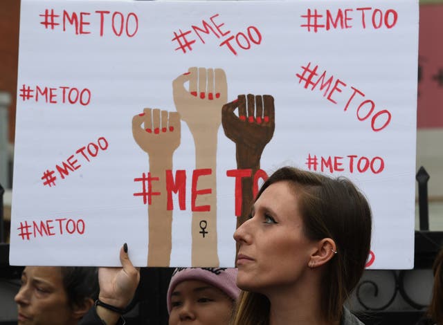 Victims of sexual harassment, sexual assault, sexual abuse and their supporters protest during a #MeToo march in Hollywood, California on November 12, 2017. One of the government’s newly appointed equality commissioners is facing scrutiny over past comments deriding the #MeToo movement.
