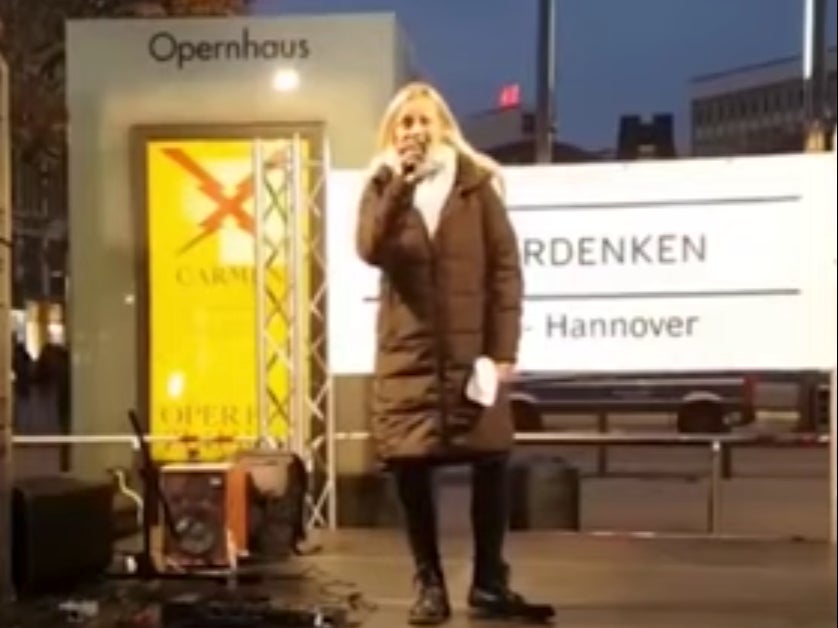 Covid protester speaks during demonstration in Hannover