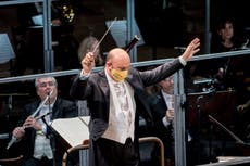 In Italy, theater reopens in town devastated by COVID