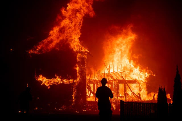 A home burns as the Camp Fire rages through Paradise, California on Thursday, November 8, 2018