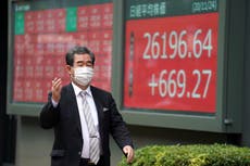 Asian shares mostly rise on virus vaccine, Yellen hopes