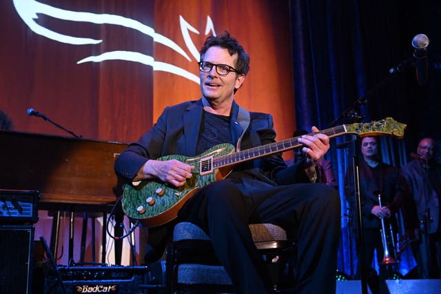 <p>Fox blues: the actor performs at a benefit last year</p>