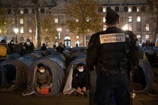 Paris police under fire for forcing migrants from tent camp