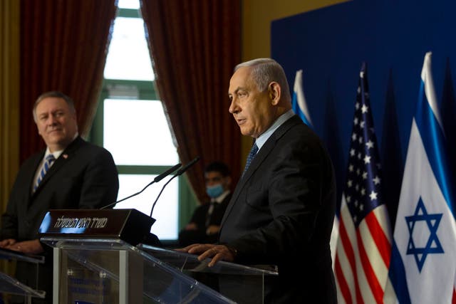 <p>Benjamin Netanyahu holds a press conference with Mike Pompeo in Jerusalem last week</p>