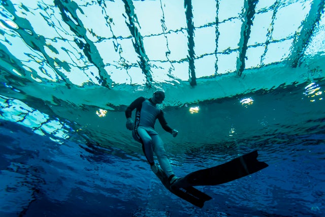 A diver is seen in the Deepspot pool, which has a 45.5m depth