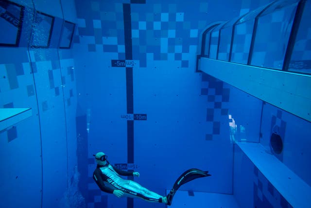 A diver explores the deepest pool in the world, which opened near Warsaw in November 