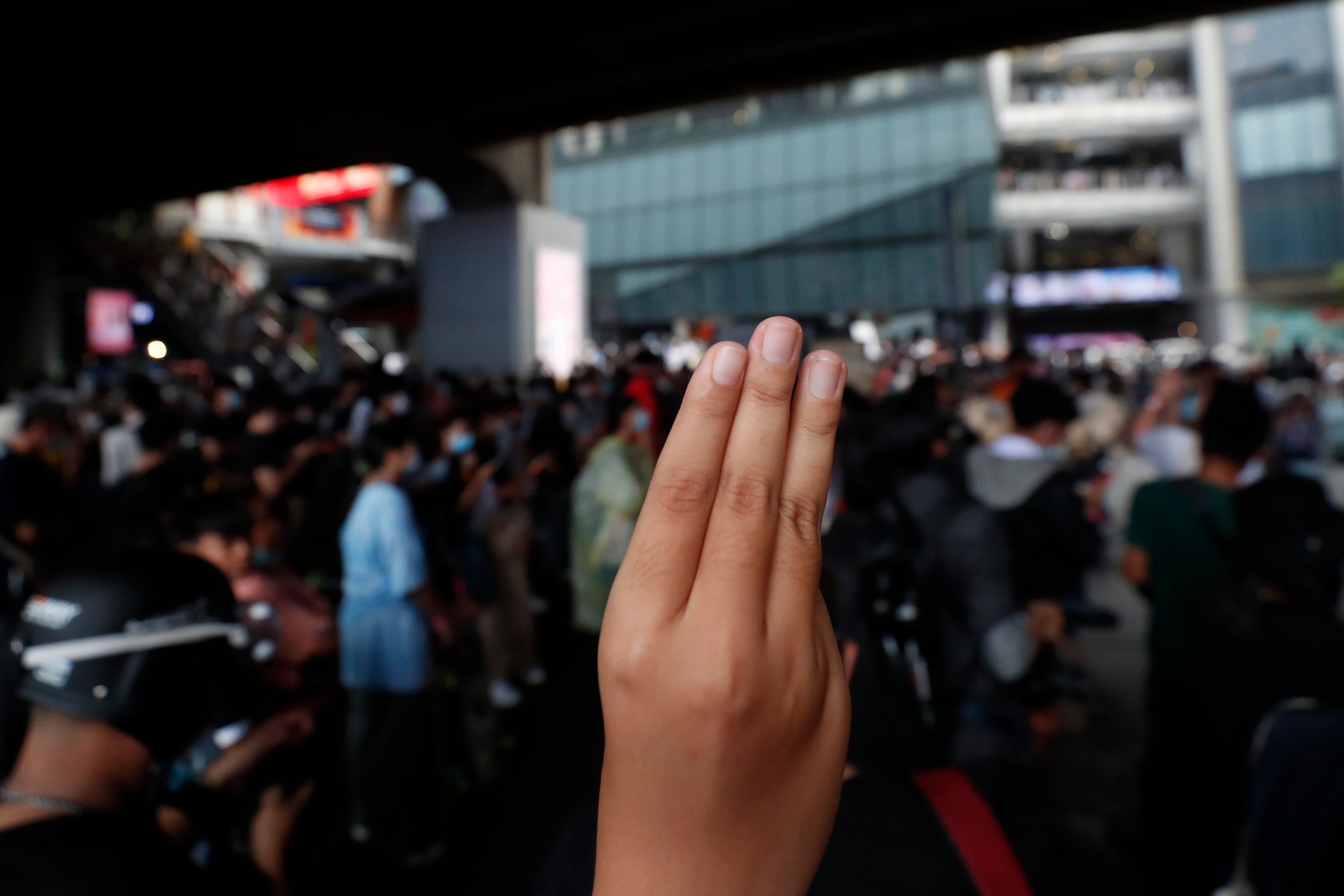 The popular three-finger protest gesture during a student rally in Bangkok on 21 November