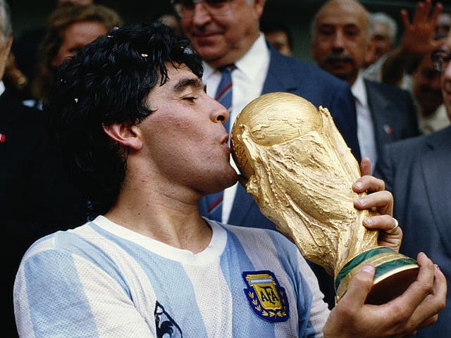 Diego Maradona celebrates winning the World Cup in 1986