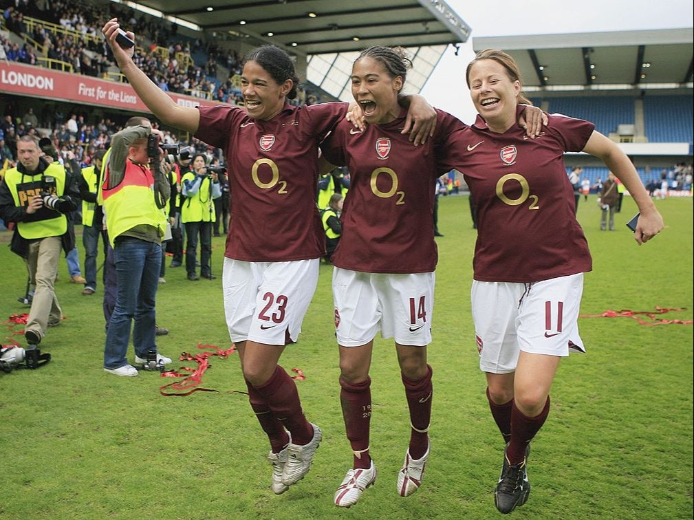 Mary Phillip (left) celebrates winning the FA Cup with Arsenal in 2006