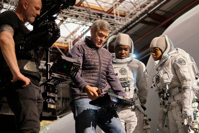 <p>George Clooney directing ‘The Midnight Sky’</p>