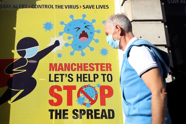 Posters urge residents of Manchester to observe coronavirus restrictions
