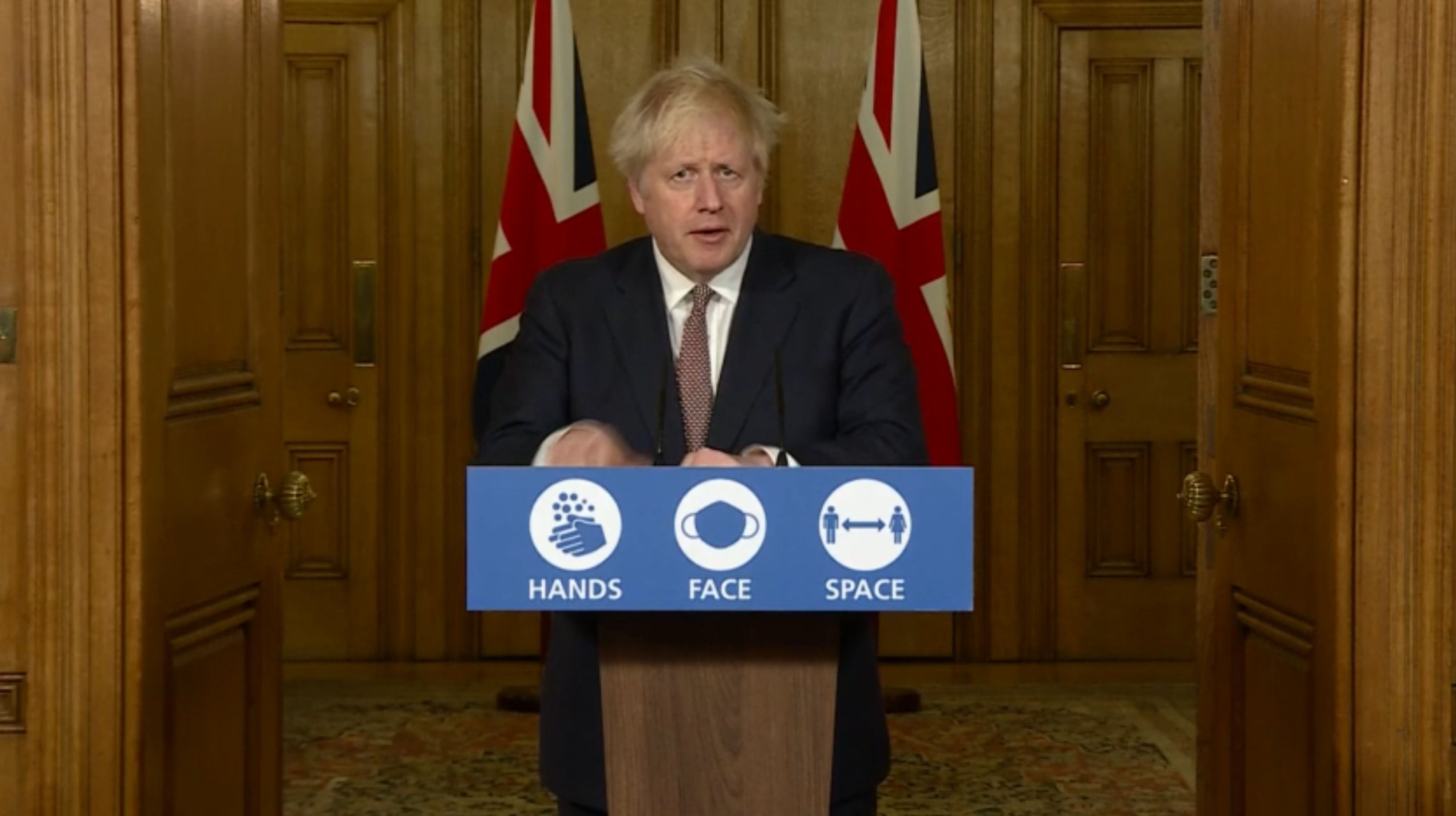 Boris Johnson addresses a Downing Street press conference