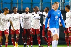 Pepe atones for red card as Arsenal cruise into knockout stages