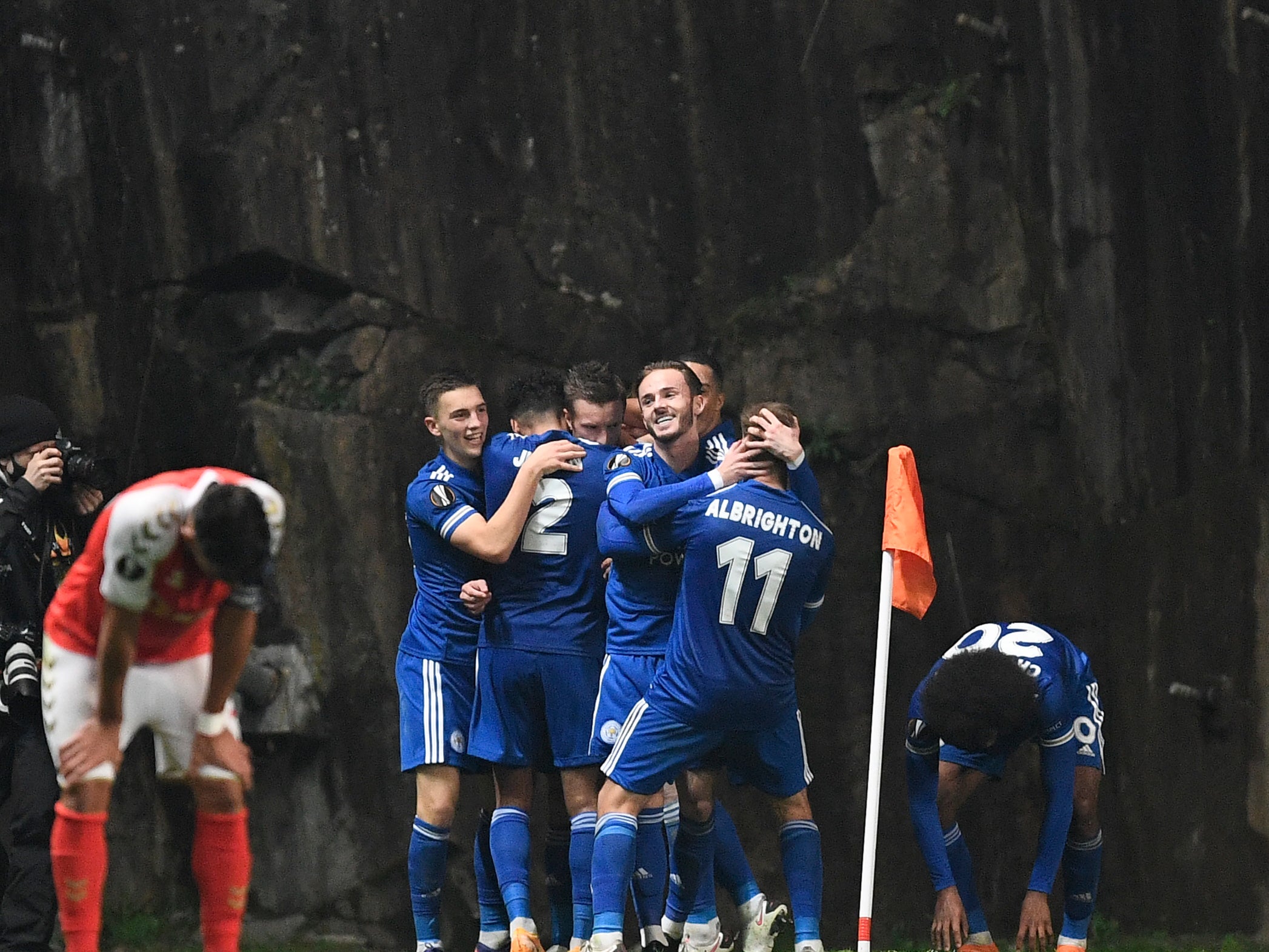 Leicester players celebrate their last-gasp draw