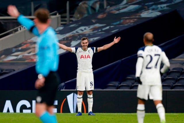 Harry Winks reacts after scoring