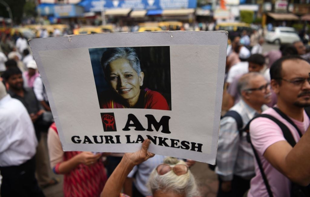 A poster held up for murdered Indian journalist Gauri Lankesh