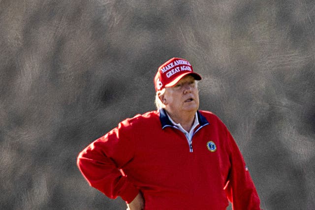 US president Donald Trump plays golf on Thanksgiving