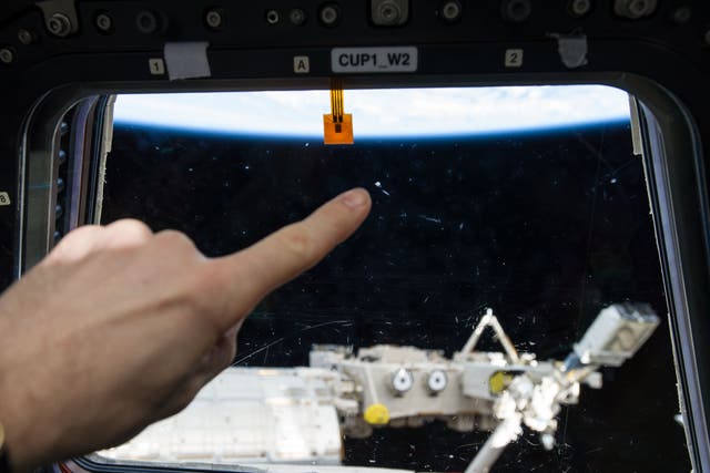 Small marks closeup were mistaken for distant unidentified flying objects from the ISS window