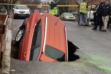 Sinkhole swallows car in New York City