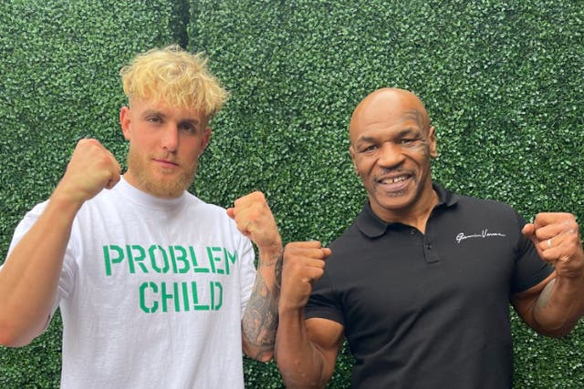 <p>Jake Paul (left) poses with Mike Tyson</p>