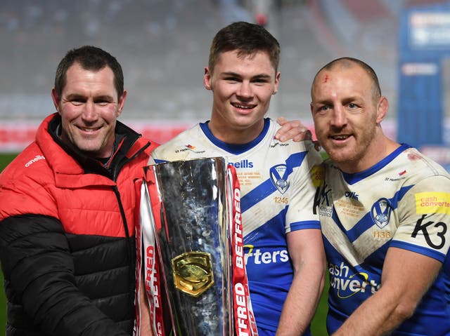 <p>Jack Welsby (centre), 19, scored a try at the last possible moment as St Helens beat Wigan</p>