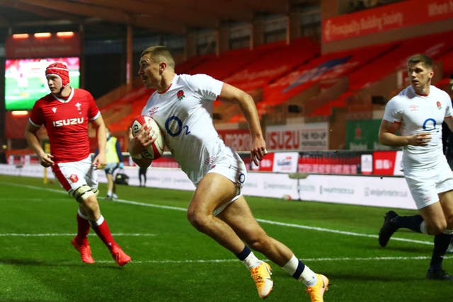Henry Slade runs in to score the first try for England