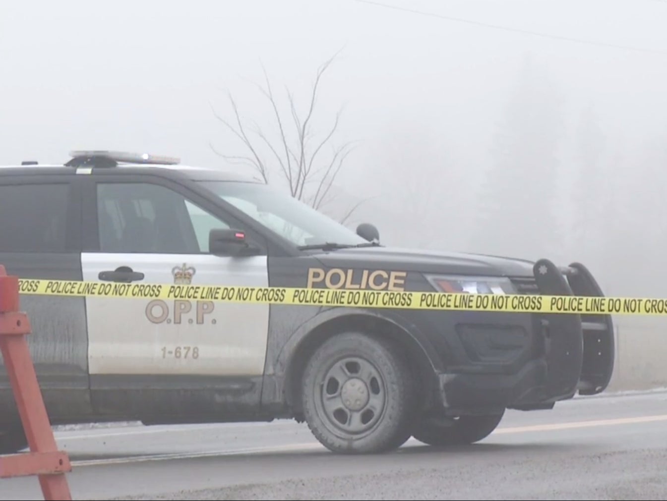 An Ontario police car on Pigeon Lake Road, where a one-year-old was shot in an alleged kidnap attempt