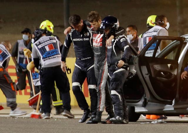 Grosjean was helped away from the scene before being airlifted to hospital