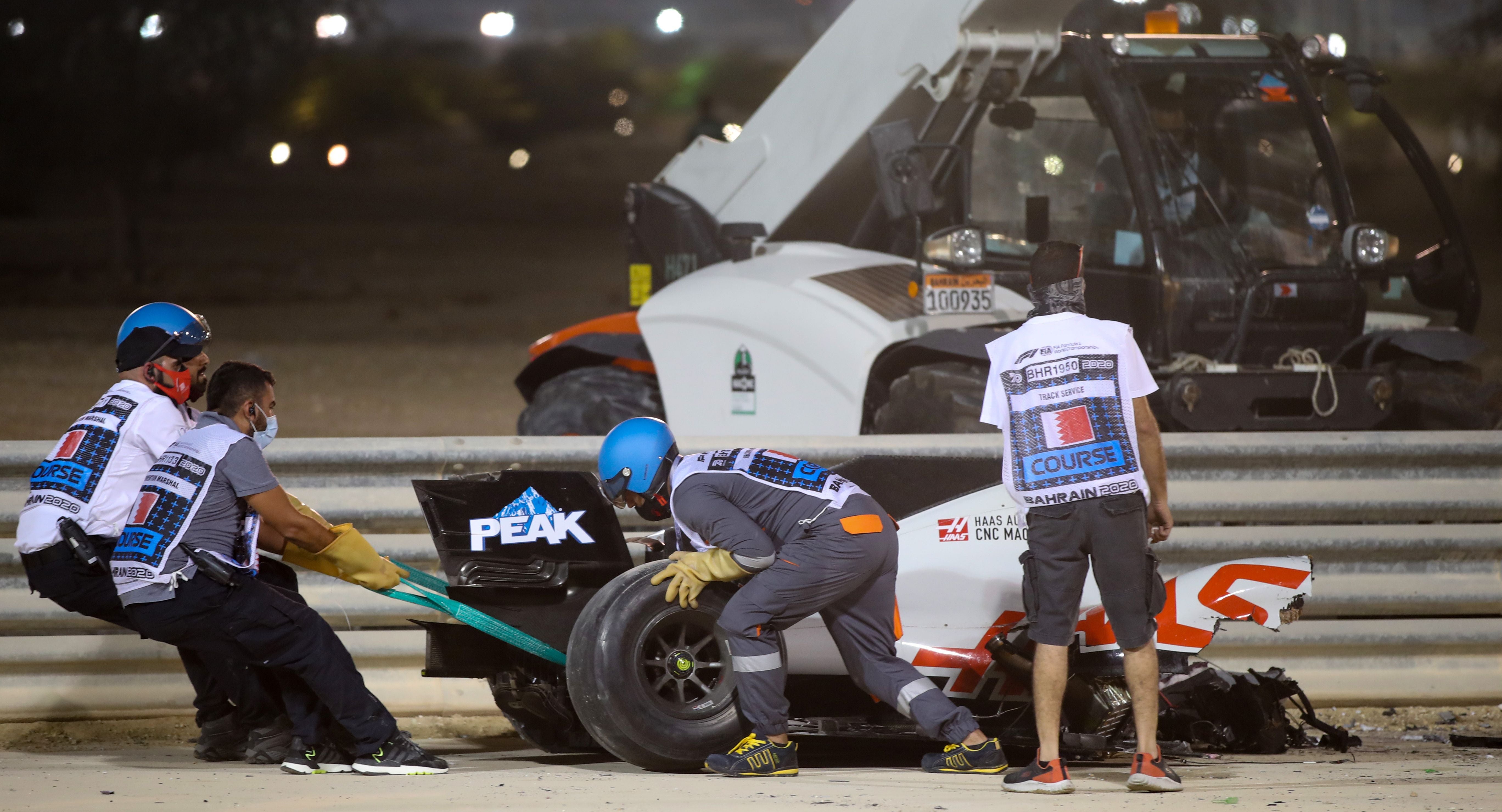 The rear section of Grosjean’s car ripped apart from the cockpit