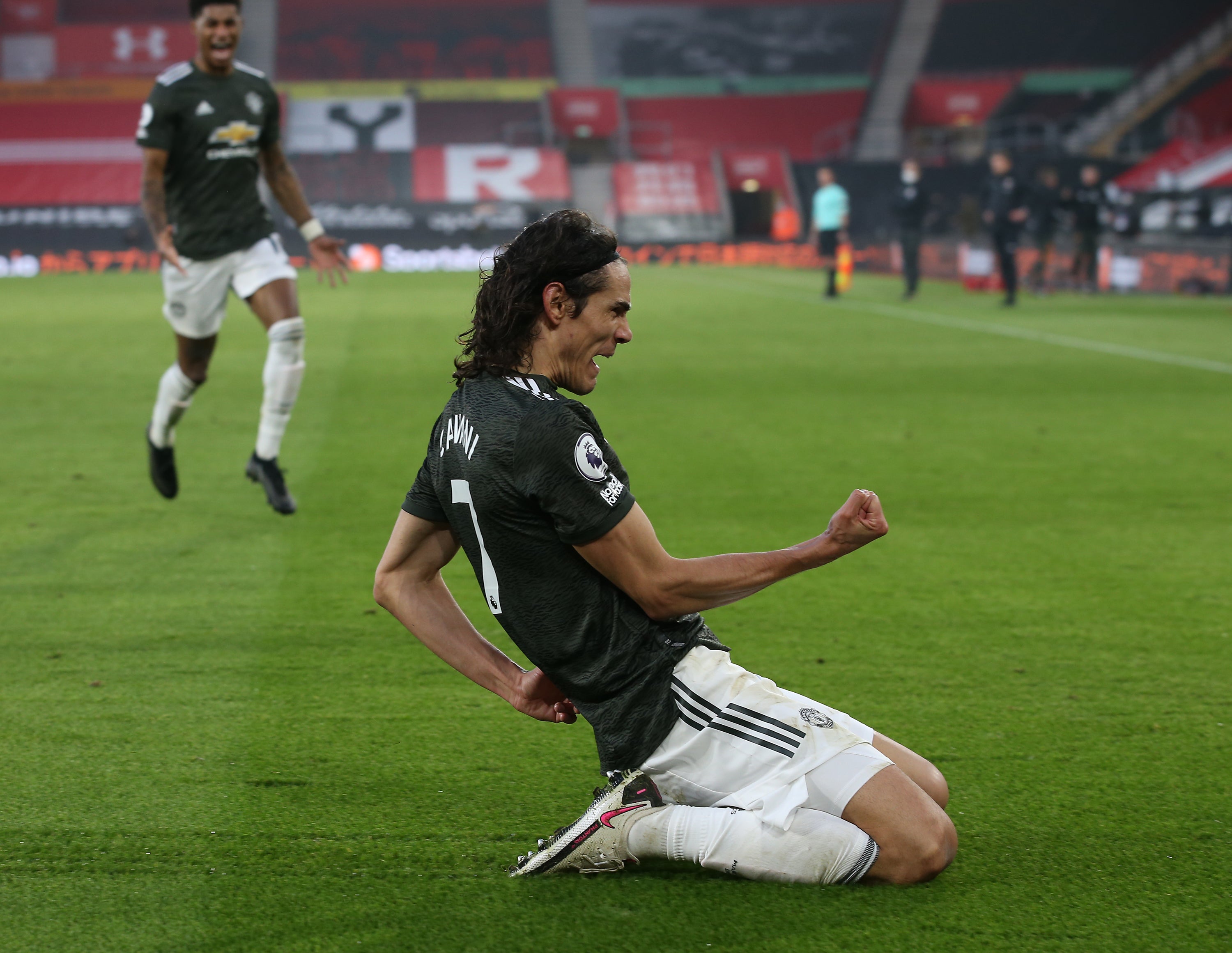 Edinson Cavani celebrates after scoring United’s winner