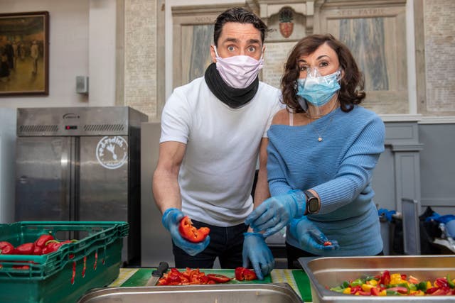 <p>Head judge on BBC One’s ‘Strictly Come Dancing’ Shirley Ballas and her partner Danny Taylor prepare and distribute food in conjunction with charities the Felix Project and With Compassion</p>
