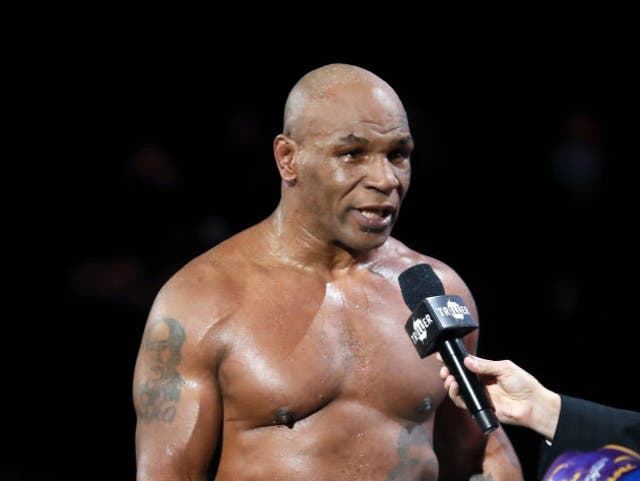 Mike Tyson reacts after receiving a split draw against Roy Jones Jr