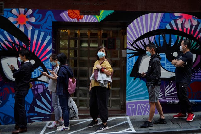 APTOPIX Virus Outbreak Hong Kong Daily Life