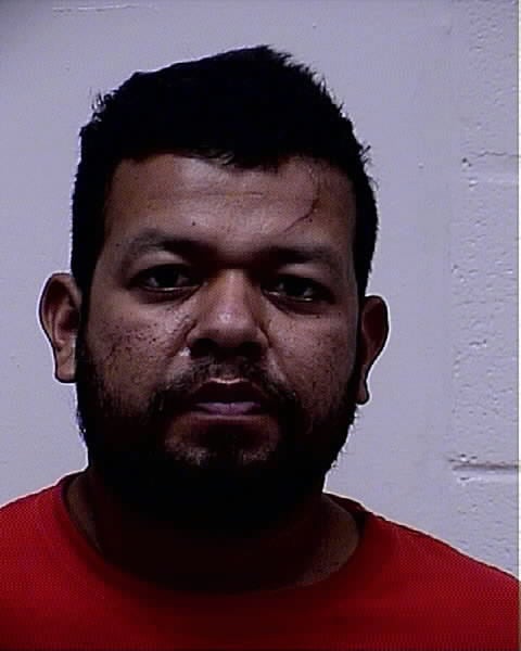 Angel Moises Rodriguez-Gomez was arrested and charged with burglary, assault, stalking and malicious destruction of property