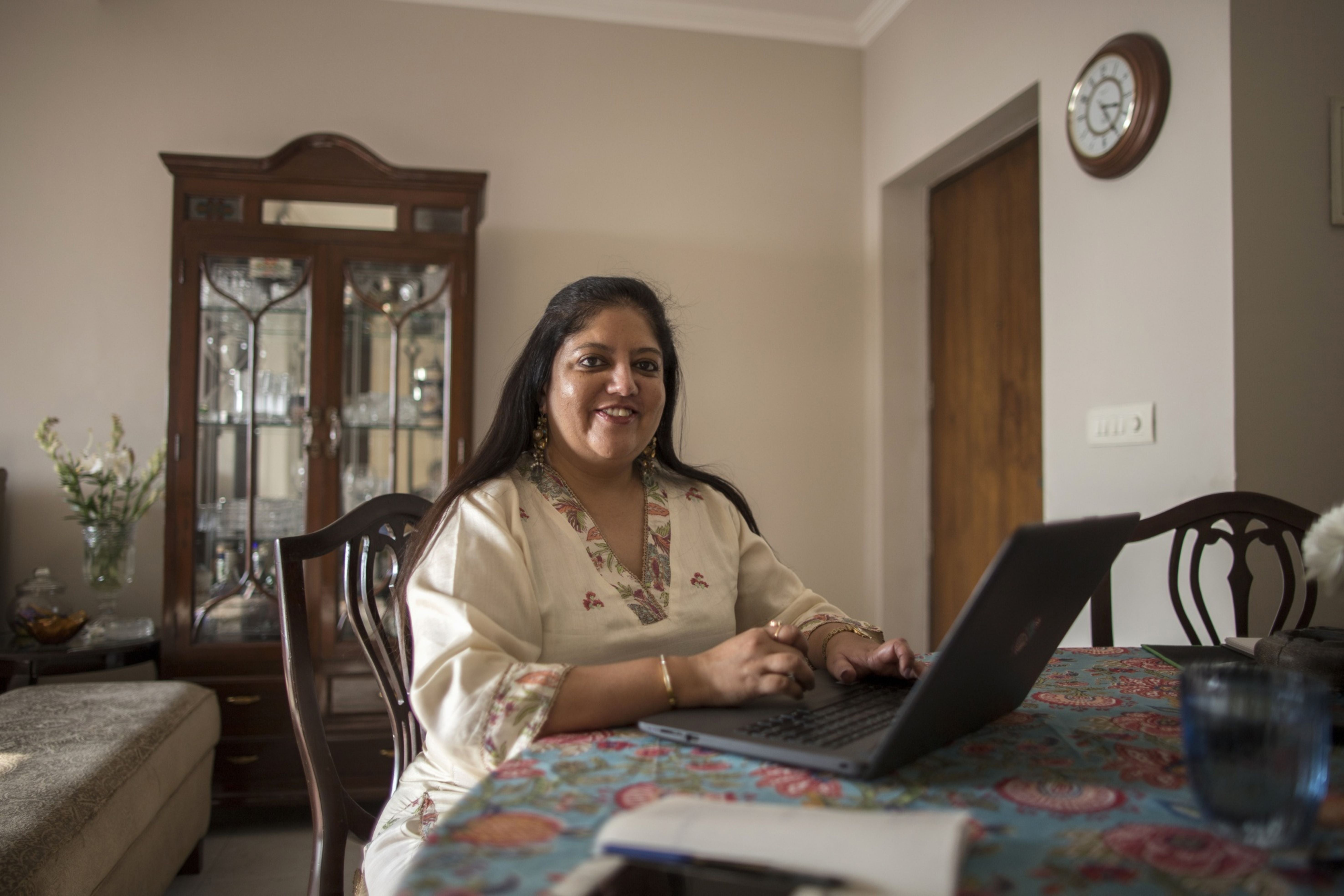 Teena Likhari landed a job working from home and is overseeing a 100-member team in the city of Pune, about 900 miles away