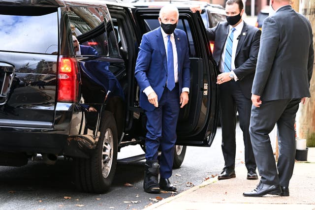 Biden shows off walking boot for fractured foot and insists he’s feeling ‘good’