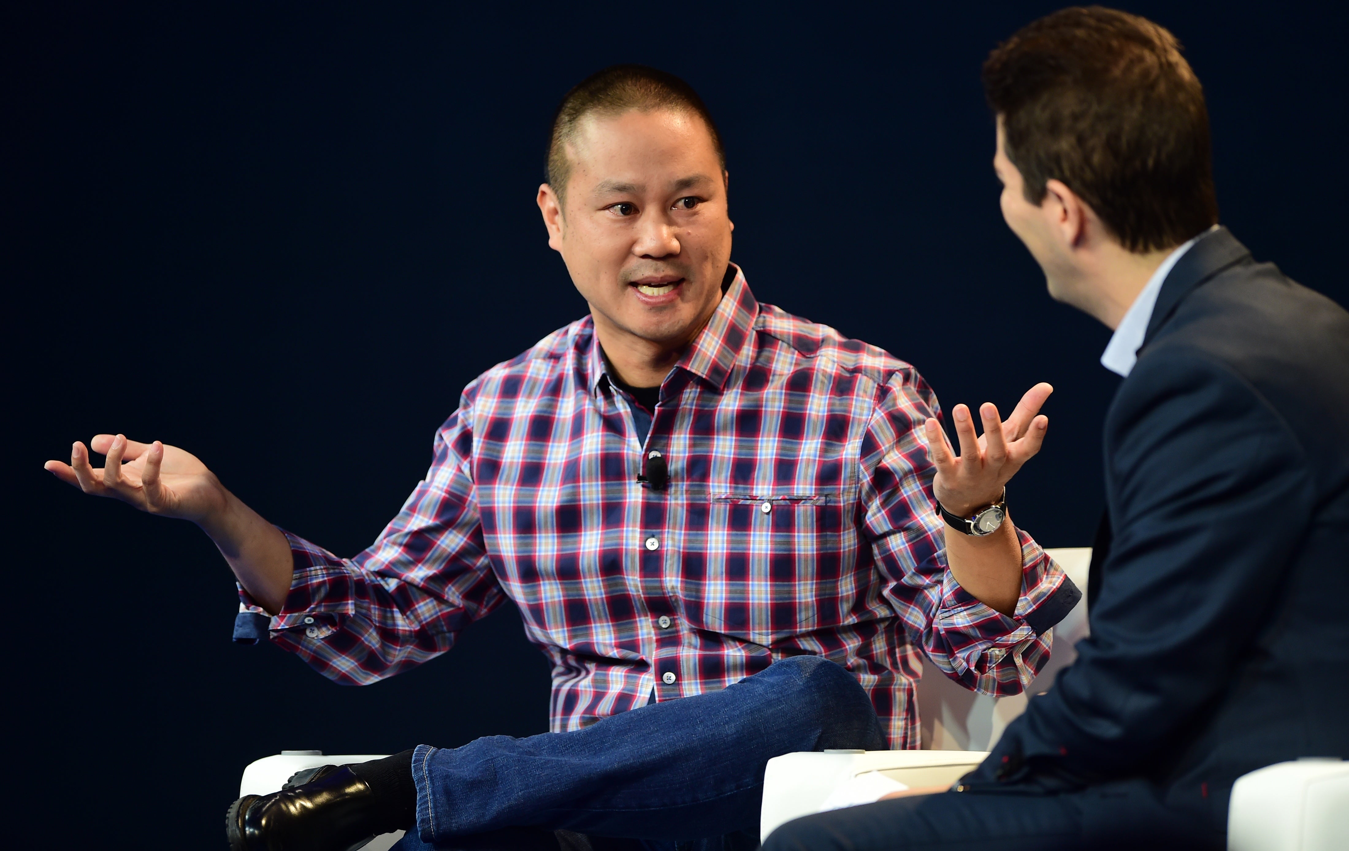 Tony Hsieh, CEO of Zappos, responds to questions from interviewer Dennis Berman at 2015 WSJD Live on October 20, 2015 in Laguna Beach, California.