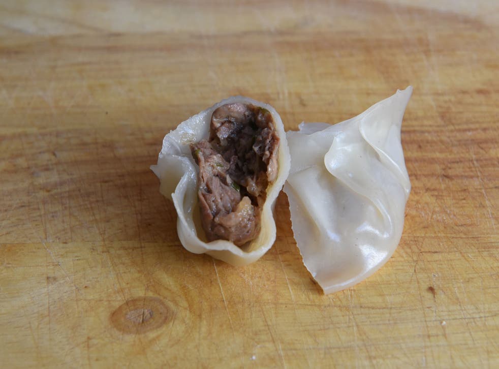 This photo taken on December 20, 2019 shows a plant-based "pork" and chive dumpling made from jackfruit in Singapore. - From lab-grown "seafood" to dumplings made with tropical fruit instead of pork, rising demand for sustainable meat alternatives in Asia is spawning creative products to appeal to local palates.