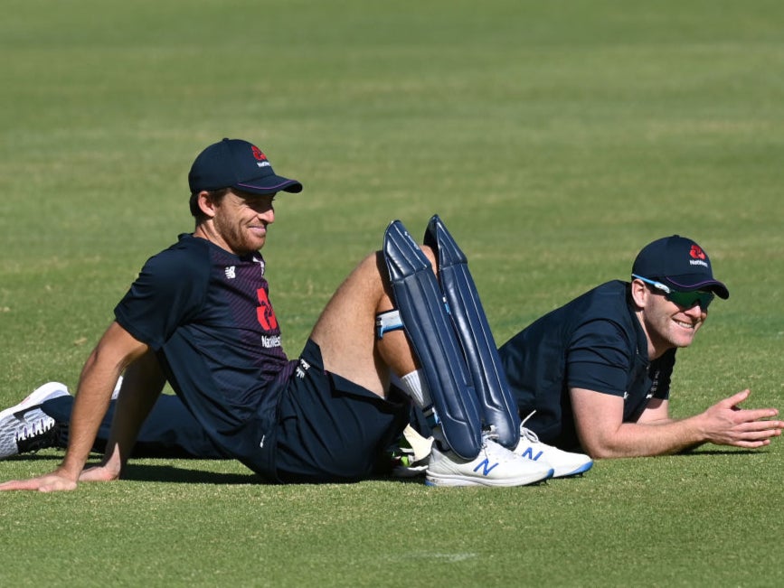 Jos Buttler and Eoin Morgan talk during a net session in South Africa