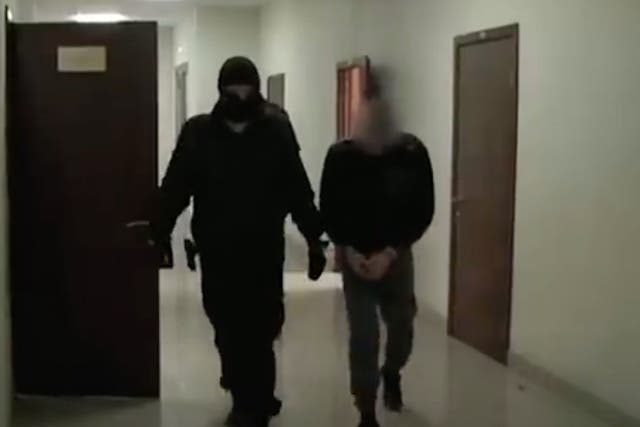  Radik Tagirov, who was arrested on suspicion of killing 26 elderly women, is pictured in custody in Russia. 