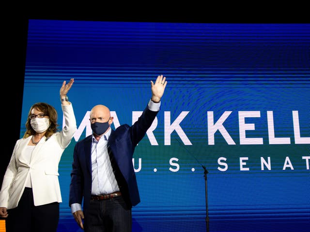 <p>Mark Kelly and Gabrielle Giffords on the night of his victory in Arizona</p>